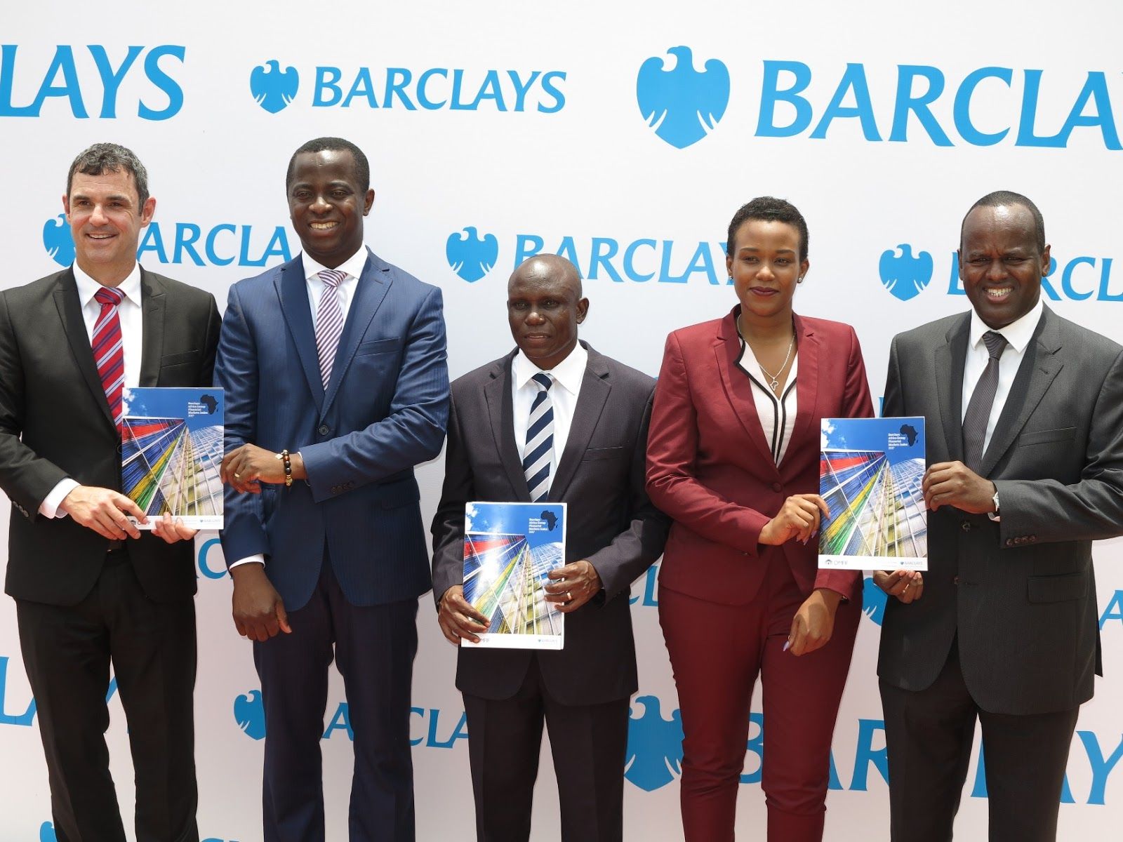 Barclays executives jointly display a new financial market service. Image Credit: Brazuka Kibenki